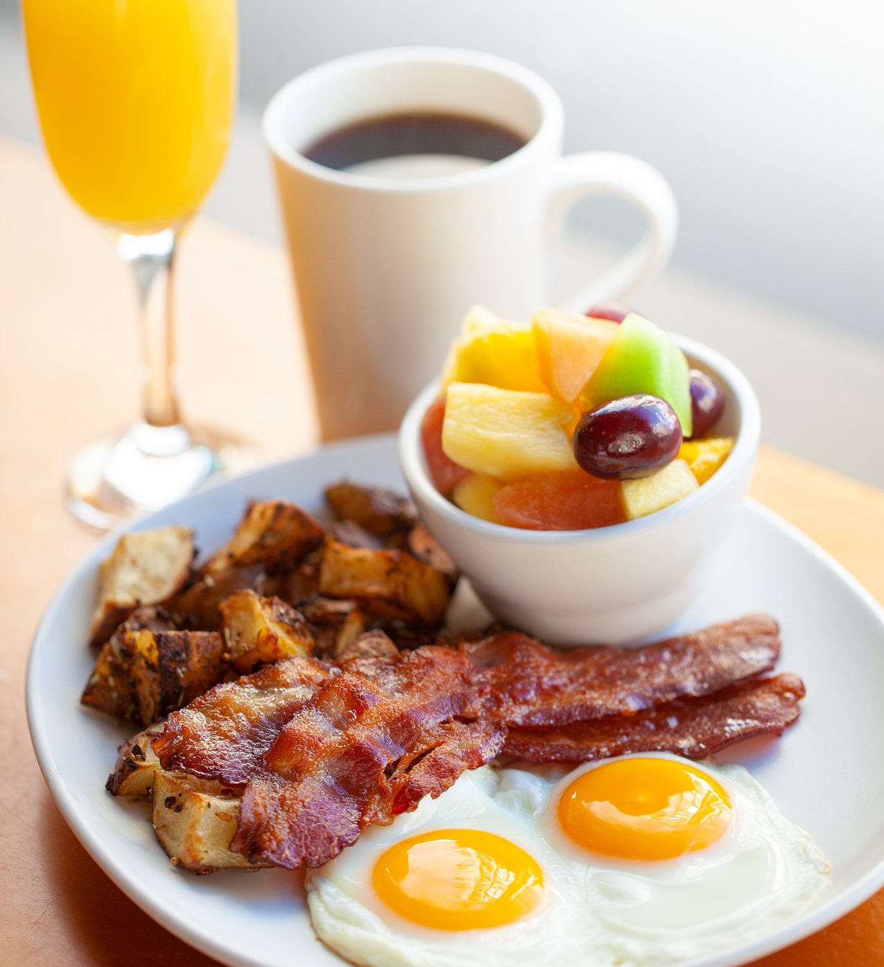 Breakfast with coffee and a mimosa
