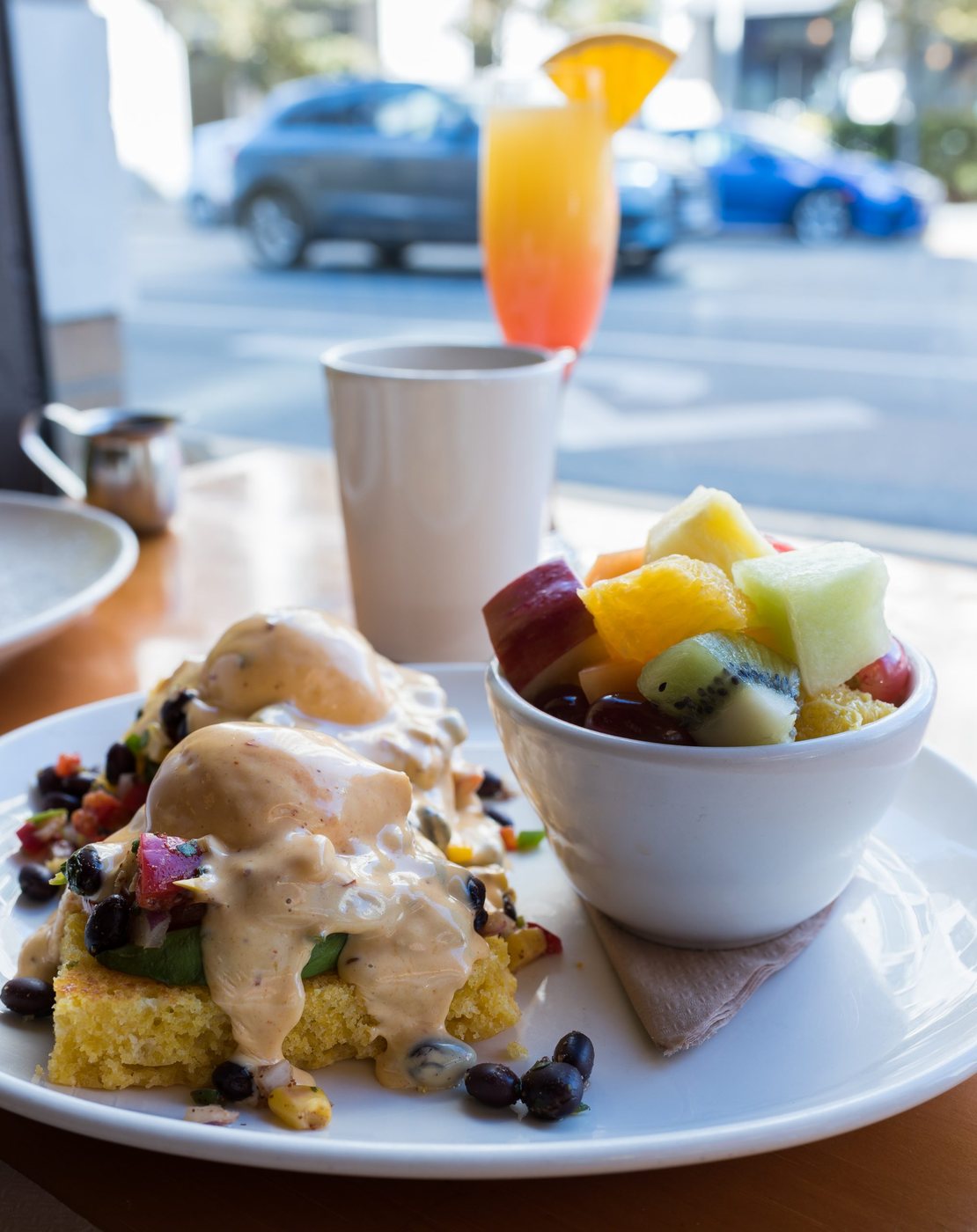 San Diego eggs Benedict with a mimosa